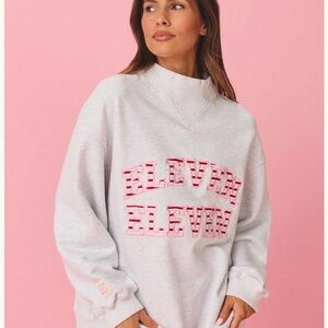 Light Gray Crewneck Sweatshirt with Pink Logo